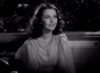 Movie still from “Waterloo Bridge” (1940), directed by Mervyn LeRoy – An old black and white photo of a beautiful woman; Close Up shot, High angle