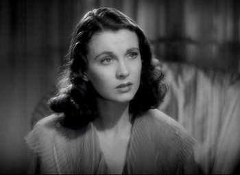 Movie still from “Waterloo Bridge” (1940), directed by Mervyn LeRoy – An old black and white photo of a woman; Close Up shot, High angle