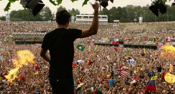 Movie still from “We Are Your Friends” (2015), directed by Max Joseph – A crowd of people at an outdoor concert; Wide shot, High angle