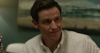 Movie still from “We Are Your Friends” (2015), directed by Max Joseph – A person wearing a white shirt; Close Up shot, Over the shoulder angle