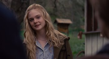 Movie still from “We Bought a Zoo” (2011), directed by Cameron Crowe – A woman with long blonde hair wearing a blue and white shirt; Close Up shot, Over the shoulder angle