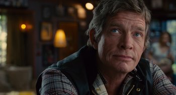 Movie still from “We Bought a Zoo” (2011), directed by Cameron Crowe – A person wearing a plaid shirt; Close Up shot, Over the shoulder angle