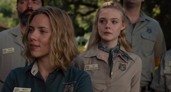 Movie still from “We Bought a Zoo” (2011), directed by Cameron Crowe – A group of people standing next to each other in a park; Close Up shot, Over the shoulder angle