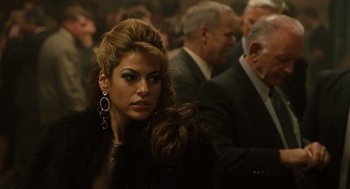 Movie still from “We Own the Night” (2007), directed by James Gray – A person wearing a fur coat; Close Up shot, Over the shoulder angle