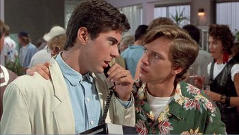 Movie still from “Weekend at Bernie's” (1989), directed by Ted Kotcheff – Two young men are talking on a phone; Close Up shot, Over the shoulder angle
