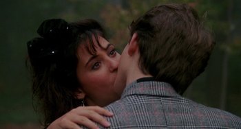 A man and a woman kissing each other