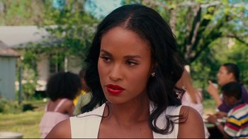 Movie still from “Welcome Home, Roscoe Jenkins” (2008), directed by Malcolm D. Lee – A person wearing a white shirt; Close Up shot, Over the shoulder angle