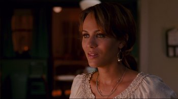 Movie still from “Welcome Home, Roscoe Jenkins” (2008), directed by Malcolm D. Lee – A woman wearing a white shirt and a necklace; Close Up shot, Over the shoulder angle