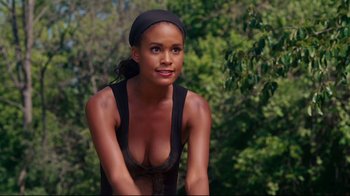 Movie still from “Welcome Home, Roscoe Jenkins” (2008), directed by Malcolm D. Lee – A beautiful young woman in a black tank top; Close Up shot, Over the shoulder angle