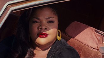 Movie still from “Welcome Home, Roscoe Jenkins” (2008), directed by Malcolm D. Lee – A woman sitting in the back seat of a car; Close Up shot, High angle