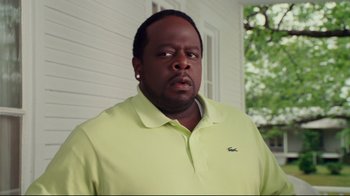 Movie still from “Welcome Home, Roscoe Jenkins” (2008), directed by Malcolm D. Lee – A man in a yellow shirt is standing in front of a house; Close Up shot, Over the shoulder angle