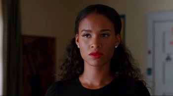 Movie still from “Welcome Home, Roscoe Jenkins” (2008), directed by Malcolm D. Lee – A beautiful young woman with a serious expression; Close Up shot, Over the shoulder angle