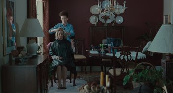 Movie still from “Welcome to the Rileys” (2010), directed by Jake Scott – A woman sitting in front of another woman in a chair; Medium shot, Over the shoulder angle