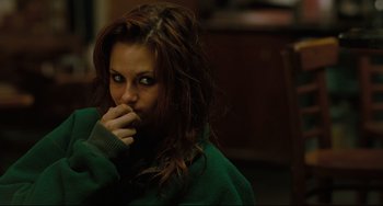 Movie still from “Welcome to the Rileys” (2010), directed by Jake Scott – A person with her hand to her mouth; Medium shot, Over the shoulder angle