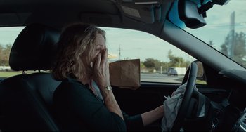 Movie still from “Welcome to the Rileys” (2010), directed by Jake Scott – A woman sitting in the driver's seat of a car; Close Up shot, Over the shoulder angle