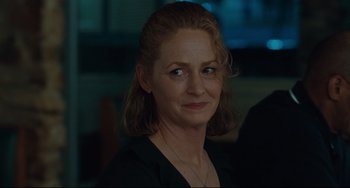 Movie still from “Welcome to the Rileys” (2010), directed by Jake Scott – A person wearing a black shirt; Close Up shot, Over the shoulder angle