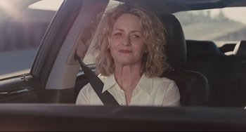 Movie still from “Welcome to the Rileys” (2010), directed by Jake Scott – A woman sitting in the driver's seat of a car; Close Up shot, Over the shoulder angle