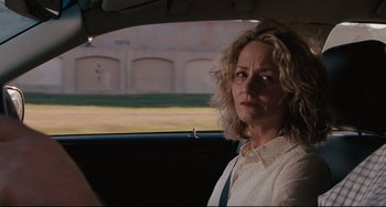 Movie still from “Welcome to the Rileys” (2010), directed by Jake Scott – A woman sitting in the back seat of a car; Close Up shot, Over the shoulder angle