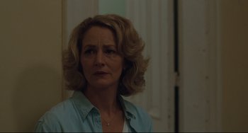 Movie still from “Welcome to the Rileys” (2010), directed by Jake Scott – A person wearing a blue shirt; Close Up shot, Over the shoulder angle