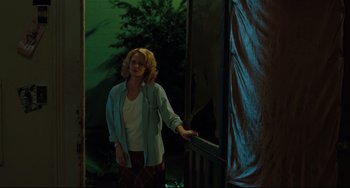 Movie still from “Welcome to the Rileys” (2010), directed by Jake Scott – A woman standing in front of a green screen; Medium shot, Low angle
