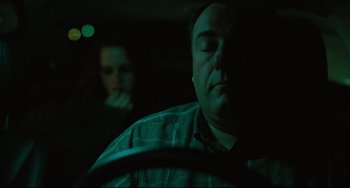 Movie still from “Welcome to the Rileys” (2010), directed by Jake Scott – A man and a woman in a car at night; Medium shot, High angle