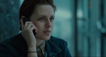 Movie still from “Welcome to the Rileys” (2010), directed by Jake Scott – A person talking on a cell phone; Close Up shot, High angle