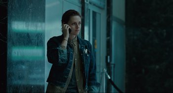 Movie still from “Welcome to the Rileys” (2010), directed by Jake Scott – A woman is talking on a cell phone; Medium shot, Over the shoulder angle