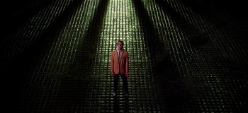 Movie still from “West Side Story” (1961), directed by Jerome Robbins – A man in a suit standing in front of a wall of lights; Extreme Wide shot, Overhead angle