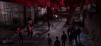 Movie still from “West Side Story” (1961), directed by Jerome Robbins – A group of people standing in a room; Extreme Wide shot, High angle