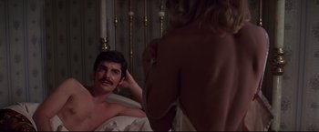 Movie still from “Westworld” (1973), directed by Michael Crichton – A man and a woman in a bath tub; Medium shot, Over the shoulder angle