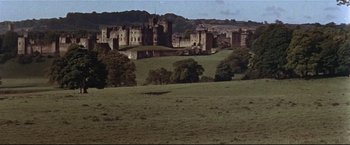 Movie still from “Westworld” (1973), directed by Michael Crichton – An image of a castle in the middle of a green field; Extreme Wide shot, High angle