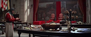 Movie still from “Westworld” (1973), directed by Michael Crichton – A table with a bowl of food on top of it; Wide shot, High angle