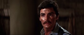 Movie still from “Westworld” (1973), directed by Michael Crichton – A person with a mustache; Close Up shot, High angle