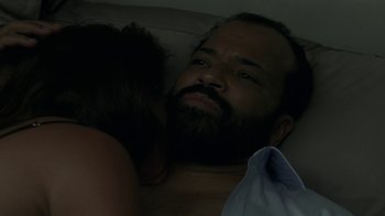 Movie still from “Westworld” (2016), created by Lisa Joy – A man and woman laying in a bed together; Close Up shot, Overhead angle