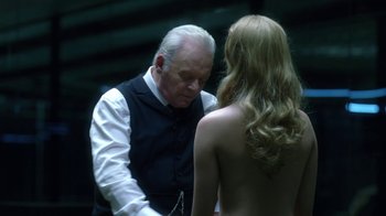 Movie still from “Westworld” (2016), created by Lisa Joy – An older man and a young woman are looking at each other; Close Up shot, Over the shoulder angle
