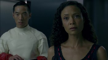 Movie still from “Westworld” (2016), created by Lisa Joy – A woman standing next to a man in front of a mirror; Close Up shot, Over the shoulder angle
