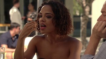 Movie still from “Westworld” (2016), created by Lisa Joy – A woman with curly brown hair is brushing her teeth; Close Up shot, Over the shoulder angle