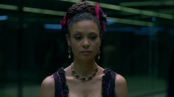 Movie still from “Westworld” (2016), created by Lisa Joy – A person wearing a dress; Close Up shot, Over the shoulder angle