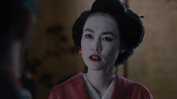 Movie still from “Westworld” (2016), created by Lisa Joy – A geisha girl with a red kimono and black hair; Close Up shot, Over the shoulder angle