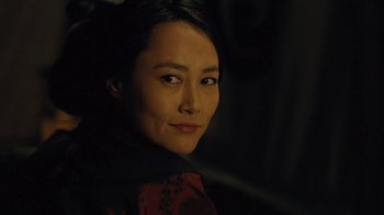 Movie still from “Westworld” (2016), created by Lisa Joy – A person wearing a red and black shirt; Close Up shot, Over the shoulder angle
