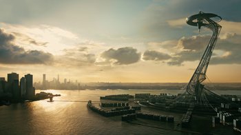 Movie still from “Westworld” (2016), created by Lisa Joy – An aerial view of a harbor with a city in the background; Extreme Wide shot, Low angle
