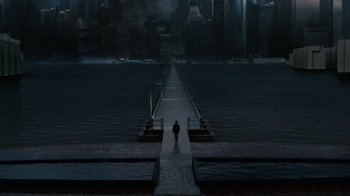 Movie still from “Westworld” (2016), created by Lisa Joy – A person walking on a bridge over a body of water; Extreme Wide shot, High angle