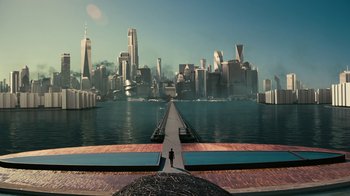 Movie still from “Westworld” (2016), created by Lisa Joy – A man standing on a pier in front of a large city; Extreme Wide shot, High angle