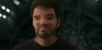 Movie still from “Another Life” (2019), created by Aaron Martin – A person with a beard; Extreme Close Up shot, High angle