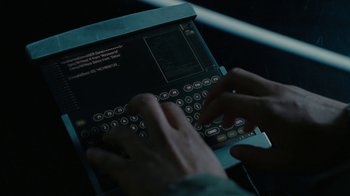 Movie still from “Westworld” (2016), created by Lisa Joy – A person typing on a laptop computer keyboard; Extreme Close Up shot, High angle