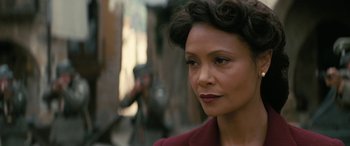 Movie still from “Westworld” (2016), created by Lisa Joy – An image of a woman in a red dress; Close Up shot, Over the shoulder angle