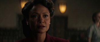 Movie still from “Westworld” (2016), created by Lisa Joy – A woman in a red jacket looking at the camera; Close Up shot, Low angle