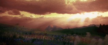 Movie still from “What Dreams May Come” (1998), directed by Vincent Ward – An oil painting of a field of flowers under a cloudy sky at sunset; Extreme Wide shot, Low angle
