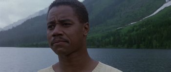 Movie still from “What Dreams May Come” (1998), directed by Vincent Ward – A person near a body of water; Close Up shot, Over the shoulder angle