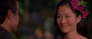 Movie still from “What Dreams May Come” (1998), directed by Vincent Ward – A person with long hair; Close Up shot, Over the shoulder angle